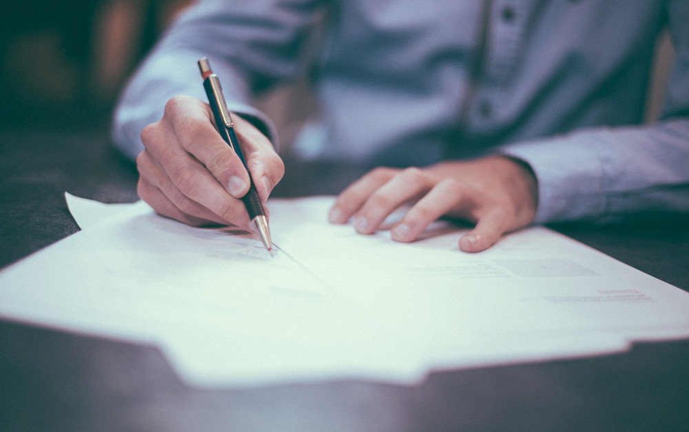 Close up of a person writing