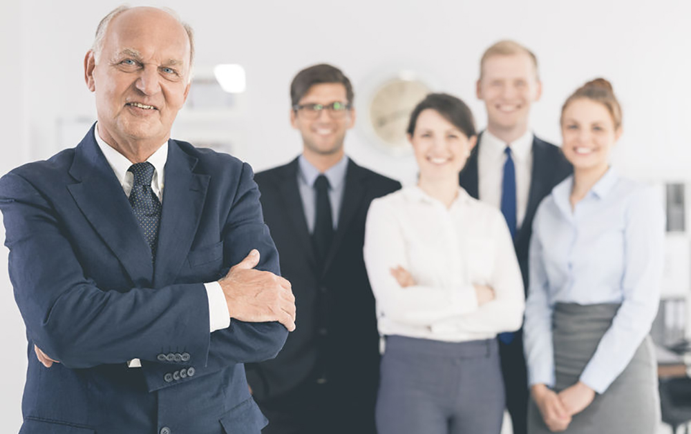 Employees posing for a portrait