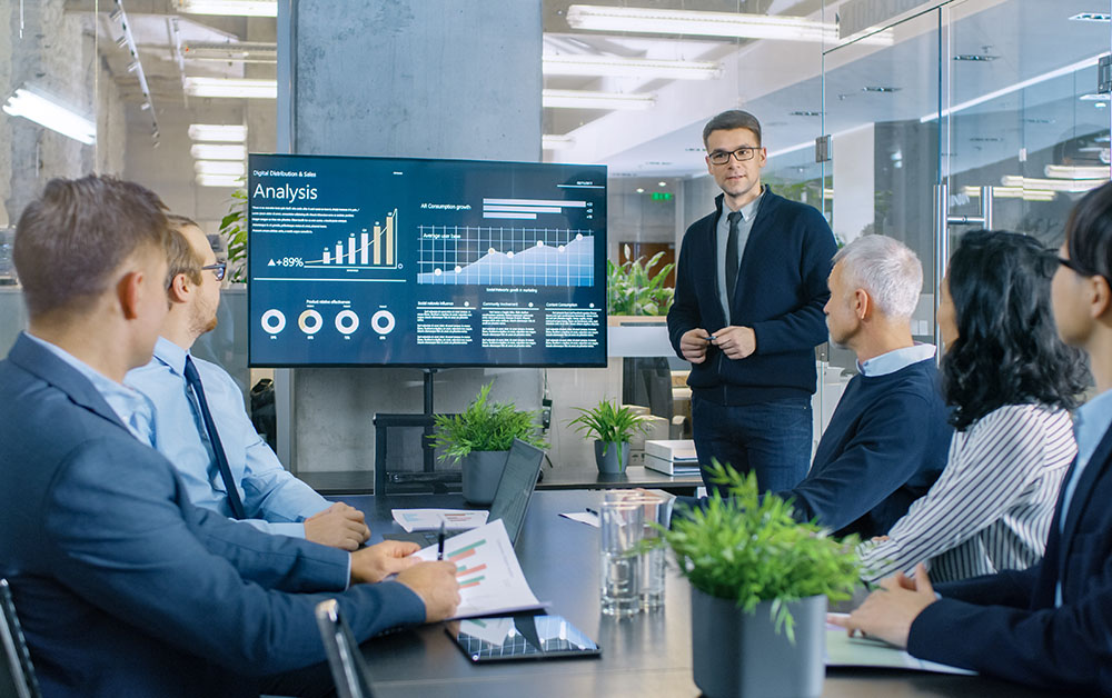 Financials are reviewed in a conference room